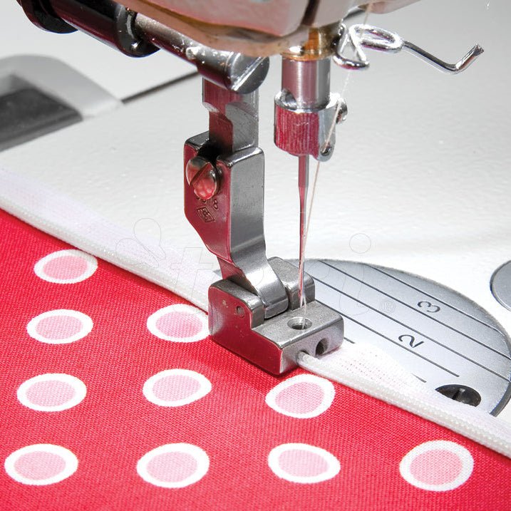 Image of an industrial sewing machine presser foot for sewing in a concealed zipper – available at Charlotte's Fabrics