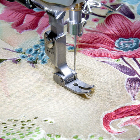 alt
Image with industrial sewing machine foot - for straight stitch on delicate fabrics – available at Charlotte's Fabrics