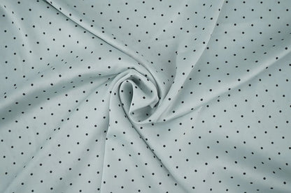 Satin with elastane - polka dots on a mint background 90 g/m²