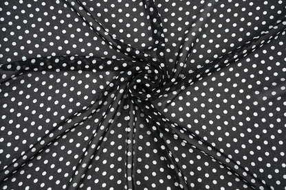 Chiffon - white polka dots on a black background | 150 cm | 65 g/m²