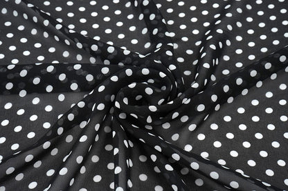 Chiffon - white polka dots on a black background | 150 cm | 65 g/m²