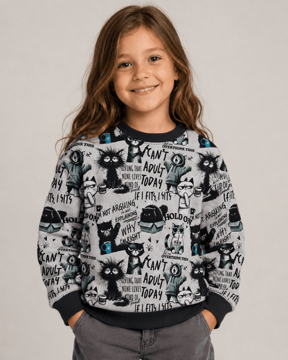 Image with insulated knitwear, Alpenfleece fabric with cats – available online at Šarlotes audumi
