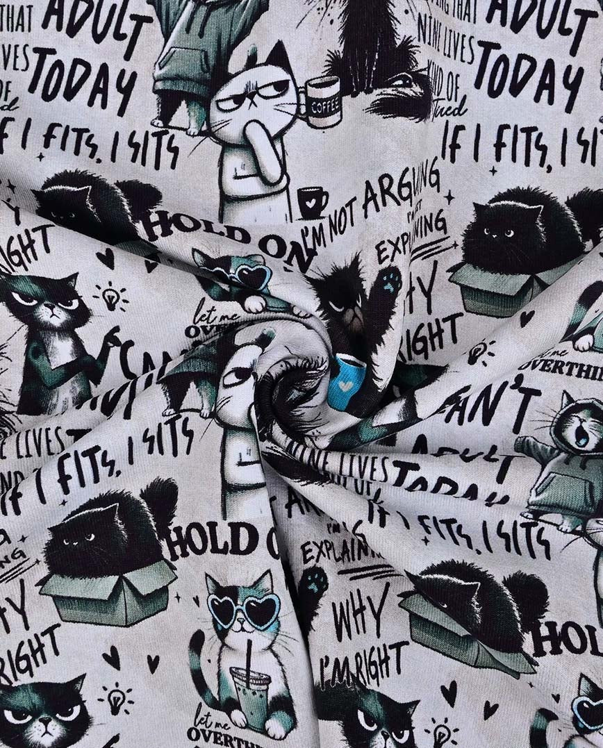 Image with insulated knitwear, Alpenfleece fabric with cats – available online at Šarlotes audumi