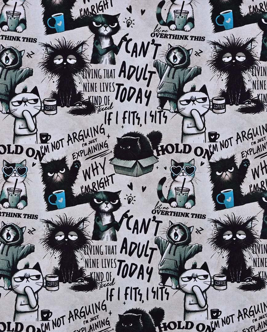 Image with insulated knitwear, Alpenfleece fabric with cats – available online at Šarlotes audumi