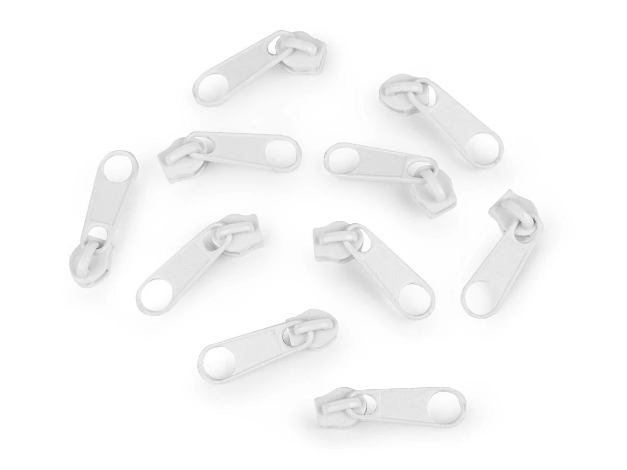 Image d’un curseur, tirette pour fermeture éclair spiralée n°3|teintes variées – disponible chez Šarlotes audumi