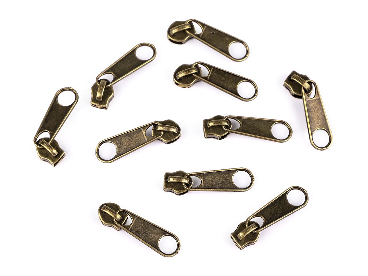 Image d’un curseur, petite languette pour fermeture éclair spirale n°3, de différentes teintes – disponible chez Šarlotes audumi