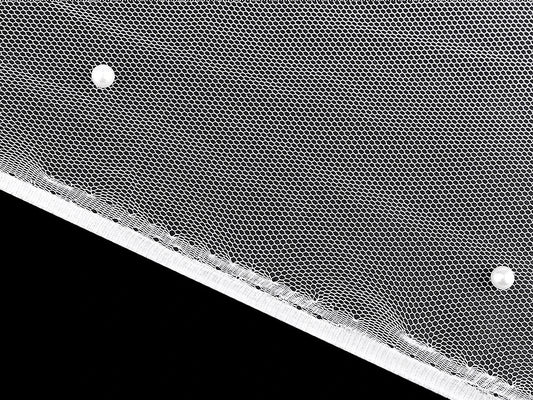 Image of fine tulle with pearls 36 g/m² - white – available at Charlotte's Fabrics