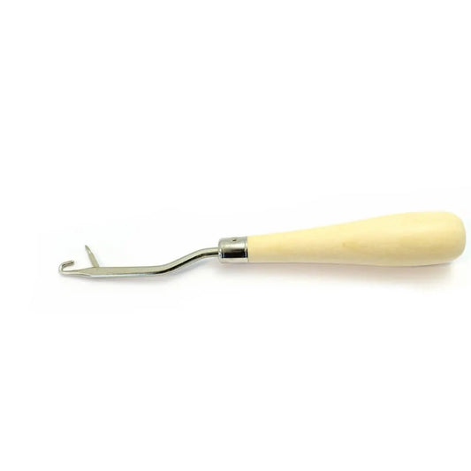 Image of a Smyrna needle for pulling stitches with a handle – available at Charlotte’s Fabrics