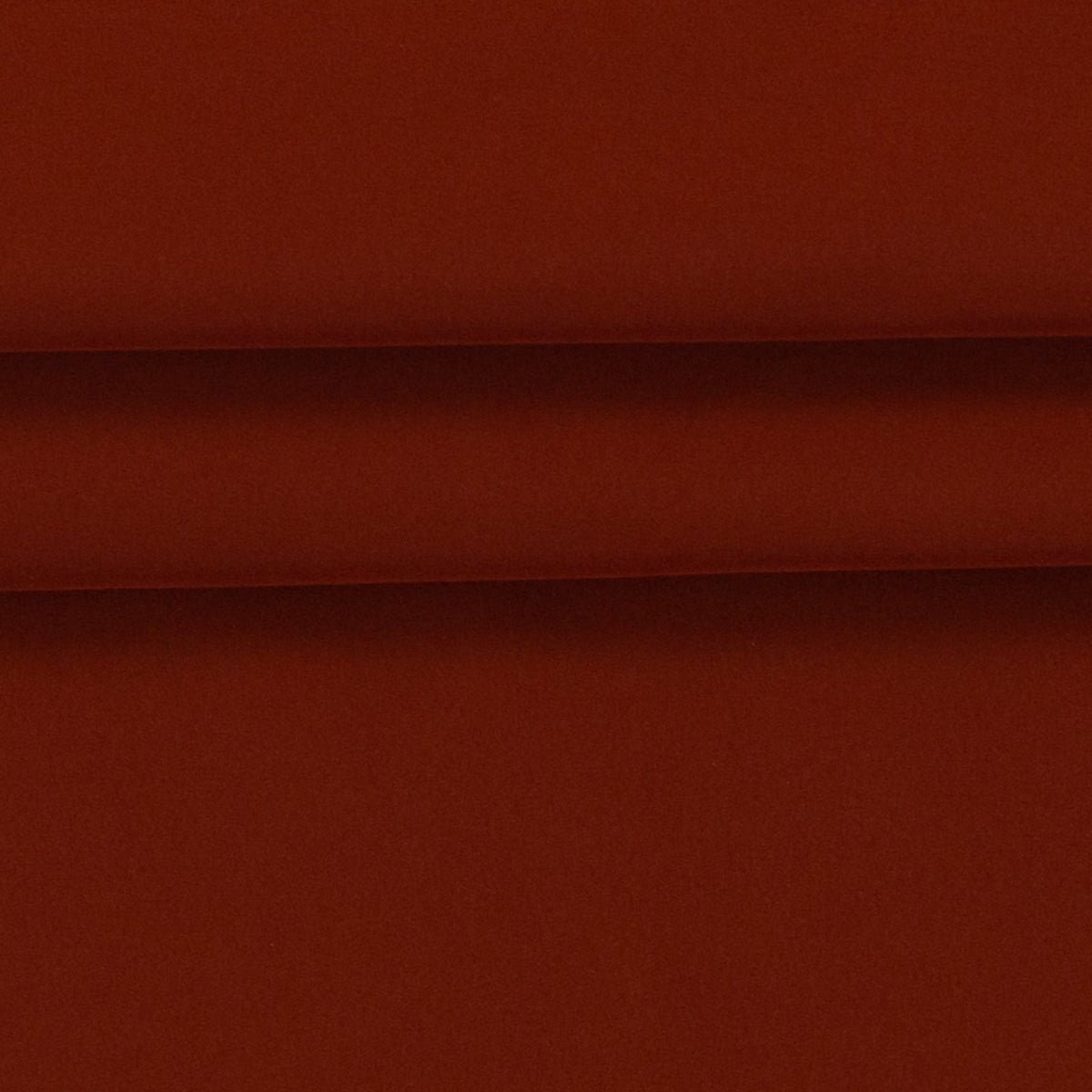 Image of waterproof brick red softshell fabric – available online at Šarlotes audumi