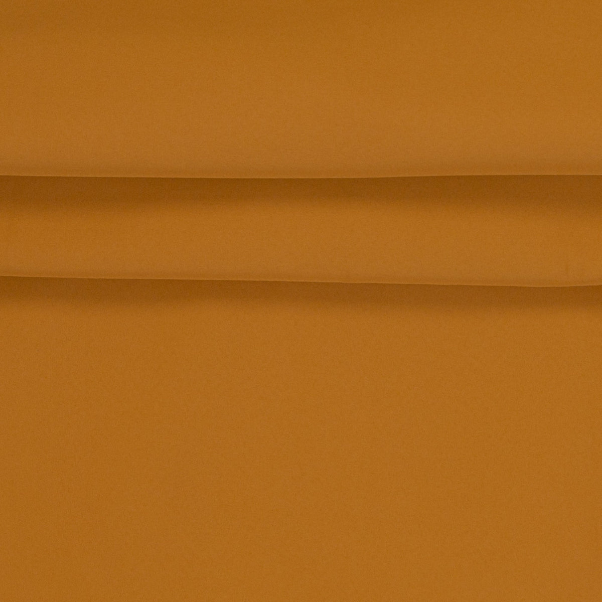 Image with waterproof softshell fabric - ochre yellow, available online at Charlotte's Fabrics