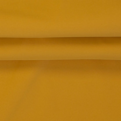 Image of waterproof softshell fabric – mustard shade, available online at Charlotte's Fabrics