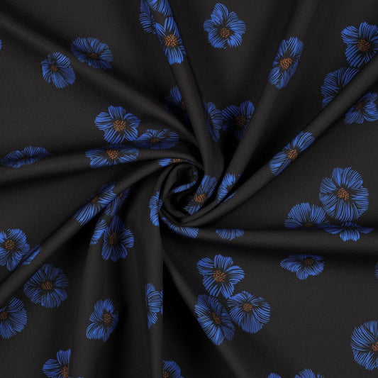 Image of blue floral softshell fabric – available online at Šarlotes audumi