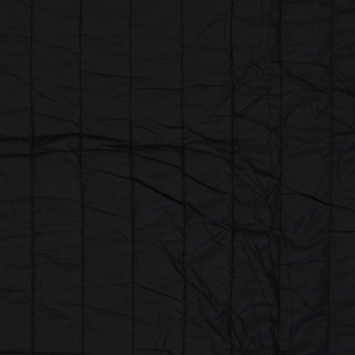 Image of quilted fabric with fleece lining - black, available online at Charlotte's Fabrics