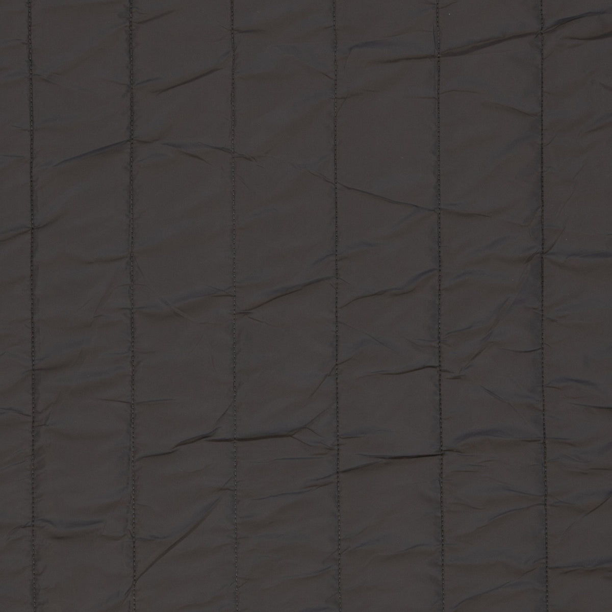 Image of gray quilted fabric with fleece lining – available online at Šarlotes audumi