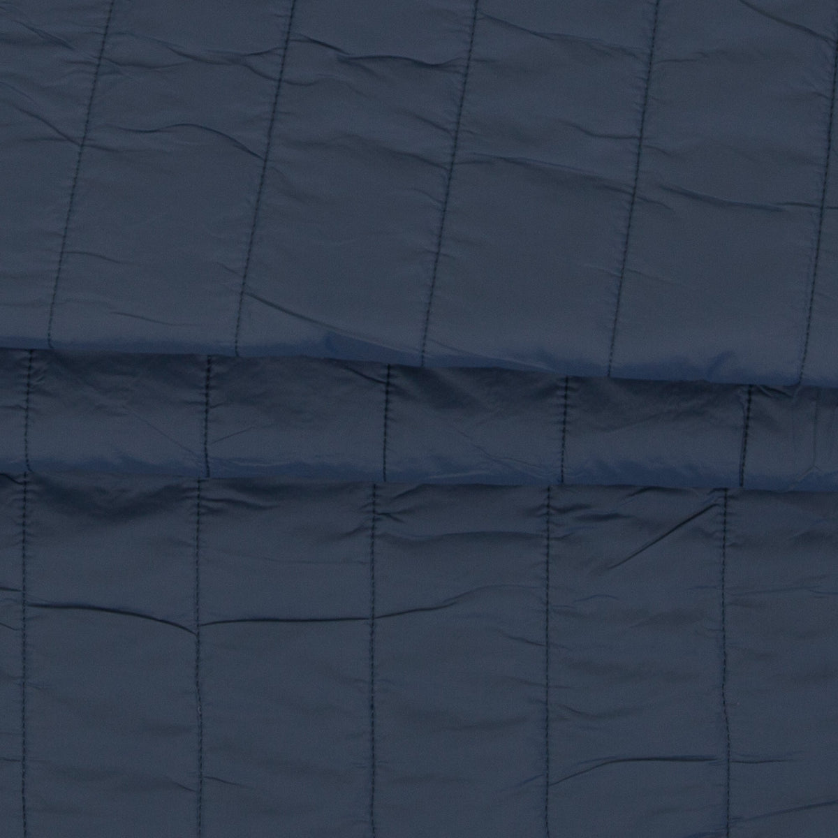 Image of quilted fabric with fleece lining - blue – available online at Šarlotes audumi