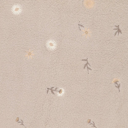 Image of Teddy fleece-embroidered flowers on a beige background – available online at Charlotte's Fabrics