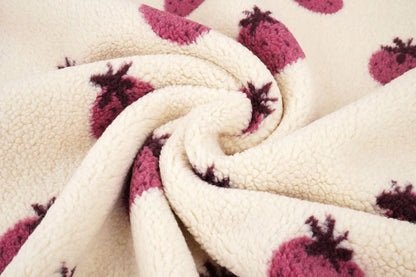Teddy fleece strawberries – available online at Šarlotes audumi