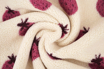 Teddy fleece strawberries – available online at Šarlotes audumi