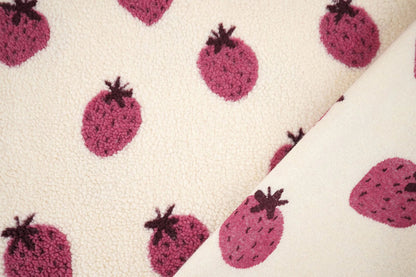 Teddy fleece strawberries – available online at Šarlotes audumi
