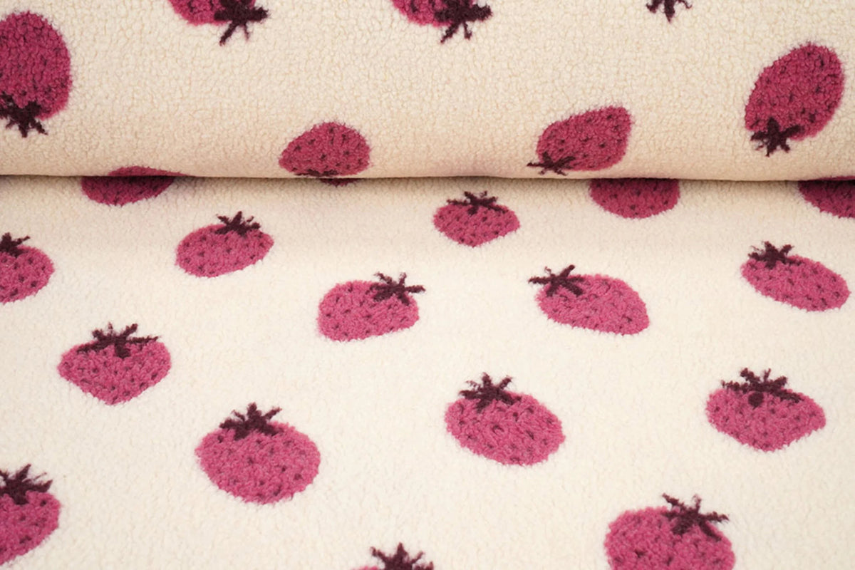 Teddy fleece strawberries – available online at Šarlotes audumi