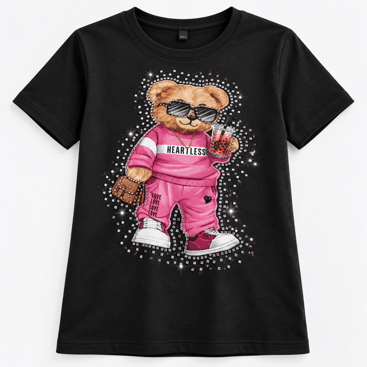Image of thermal applique “Teddy Bear in Pink Sportswear” – 29 × 20 cm – available online at Šarlotes audumi
