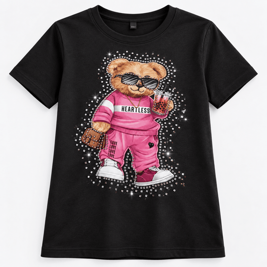 Image of thermal applique “Teddy Bear in Pink Sportswear” – 29 × 20 cm – available online at Šarlotes audumi