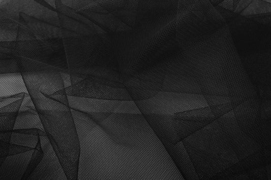 Image with stiff black tulle – available online, Šarlotes audumi