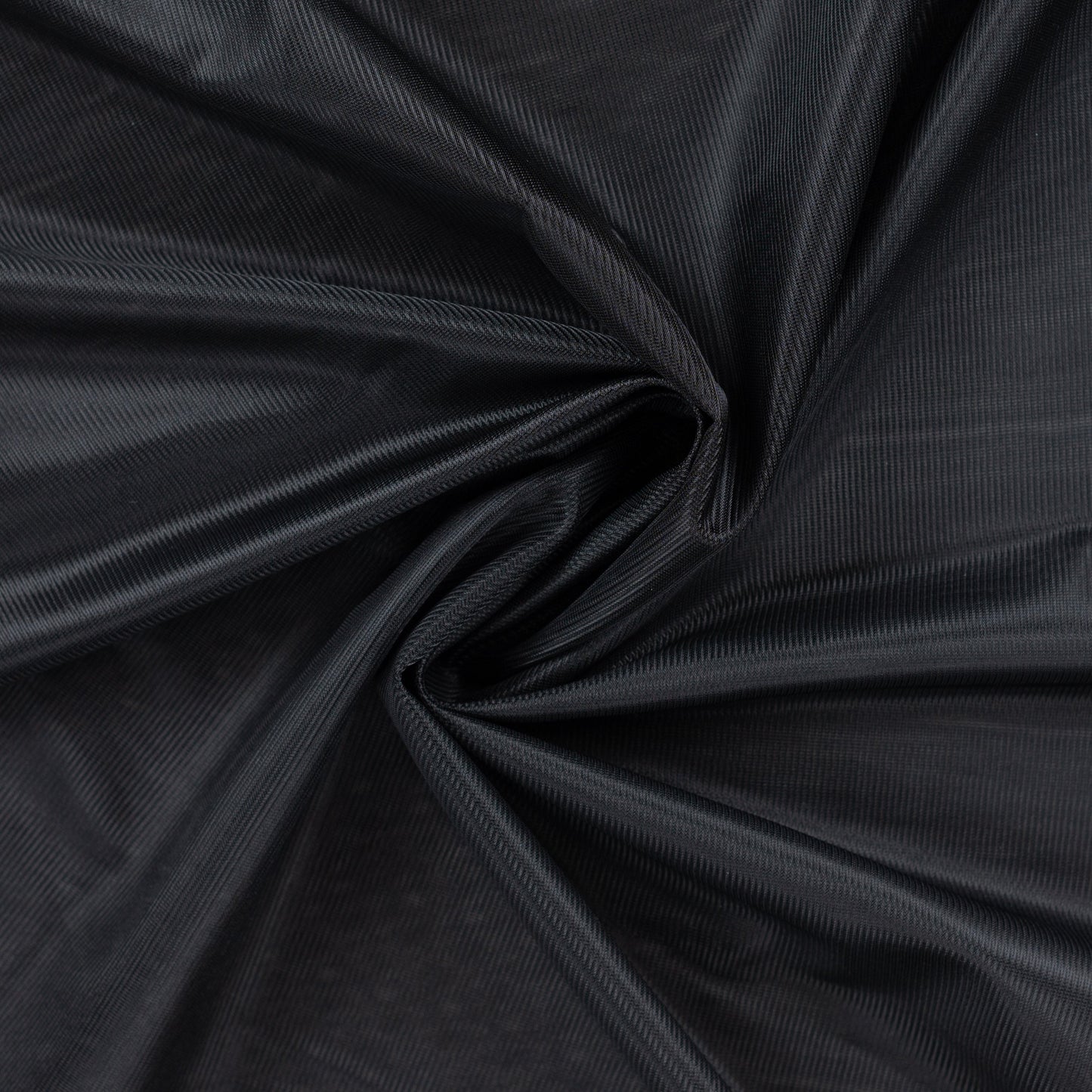 Image de tissu de doublure en jersey noir – disponible en ligne chez Šarlotes audumi