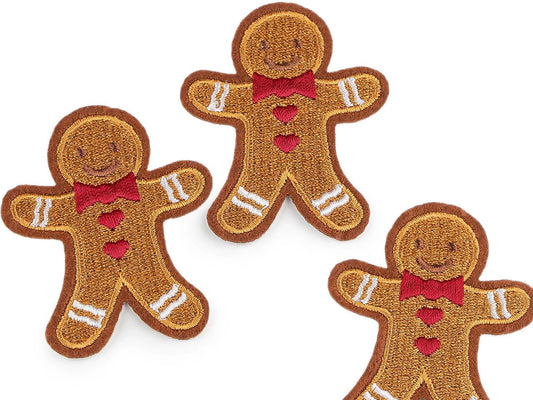Image of Iron-on gingerbread man patch 5 x 6.2 cm – embroidered fabric patch – available online at Šarlotes audumi