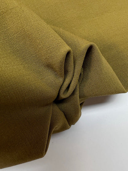 Image of wool fabric with elastane in green-brown – France – available online at Charlotte's Fabrics