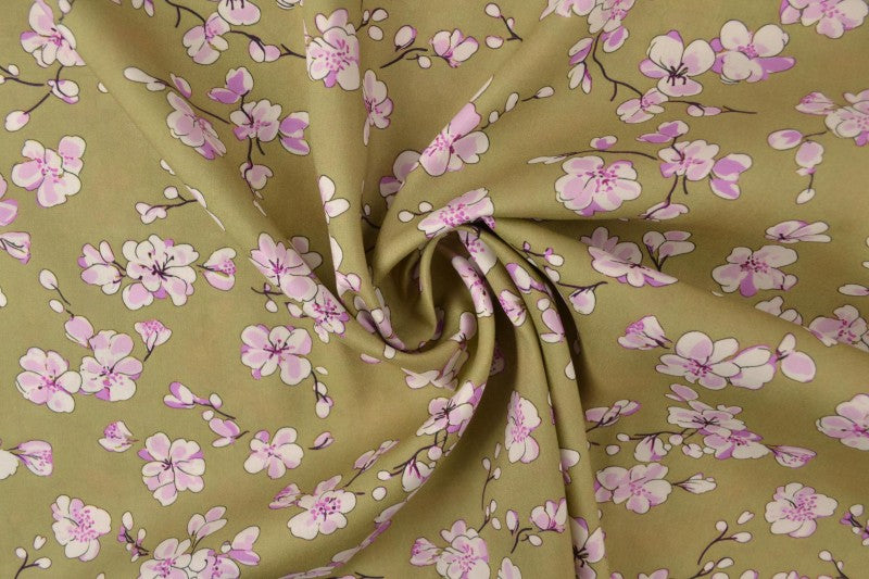 100% Viskosestoff – Kirschblüten auf pistaziengrünem Hintergrund 100 g/m²