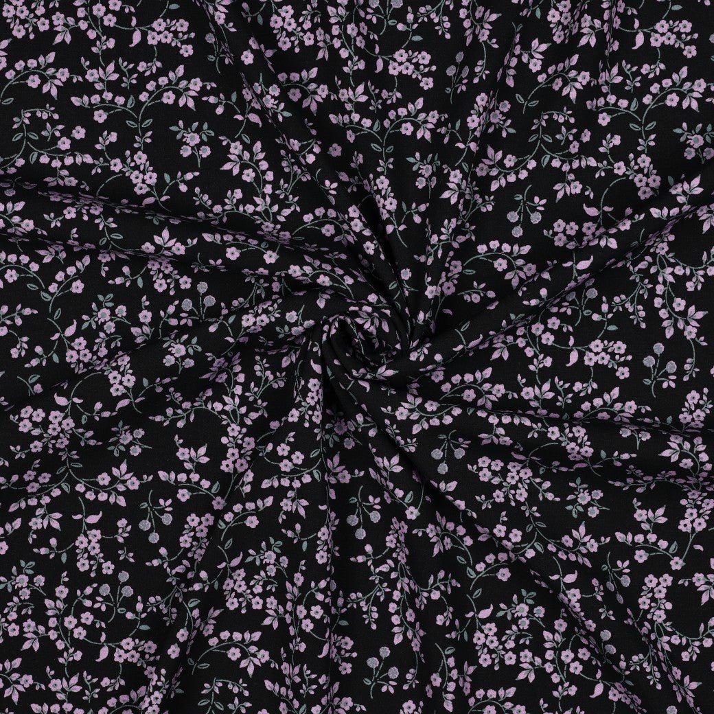 Image of viscose fabric with elastane, delicate floral pattern on black – available online at Šarlotes audumi