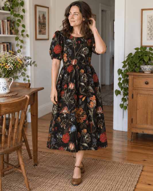 Viscose gabardine fabric with flowers on black – available online at Šarlotes audumi