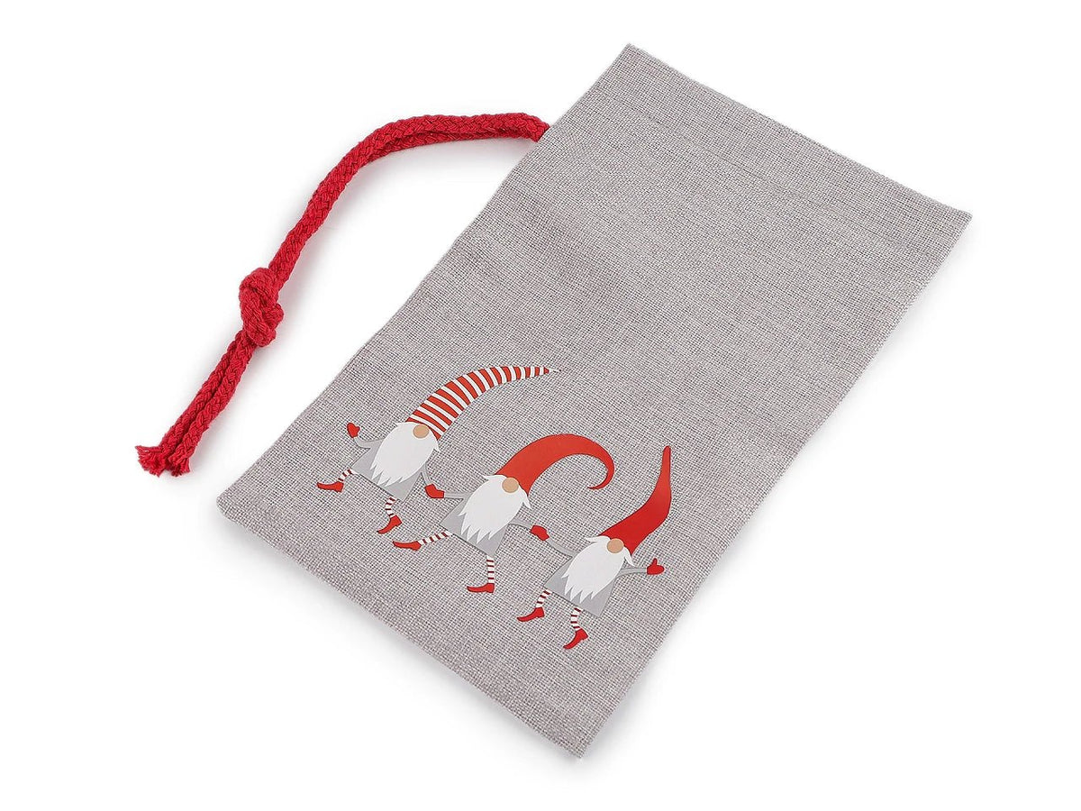 Image of a Christmas gift bag with a three-elf design 15x25 cm – available online at Šarlotes audumi
