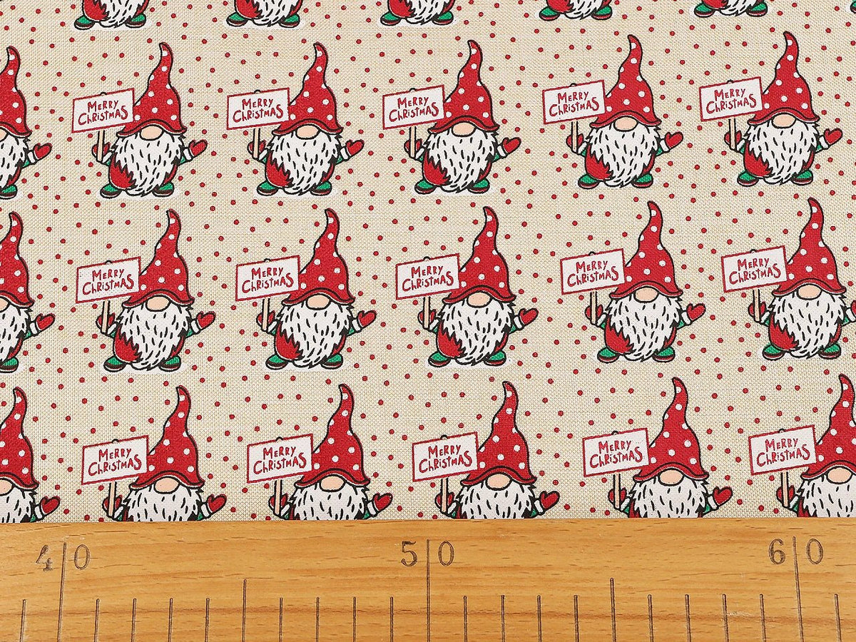 Image of Christmas decorative fabric with gnomes – available online at Charlotte's Fabrics