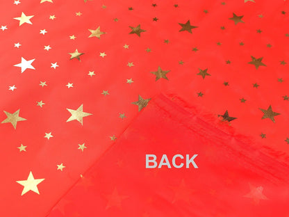 Image of Christmas decorative fabric with gold stars – available online at Šarlotes audumi