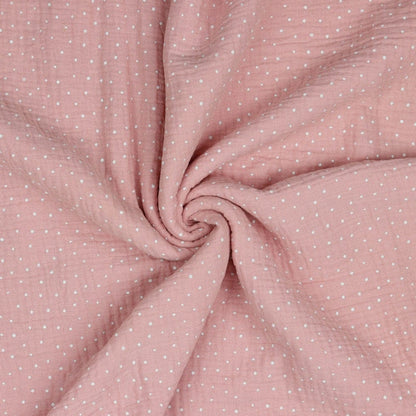 Muslin polka dots on a pink background 125 g/m²