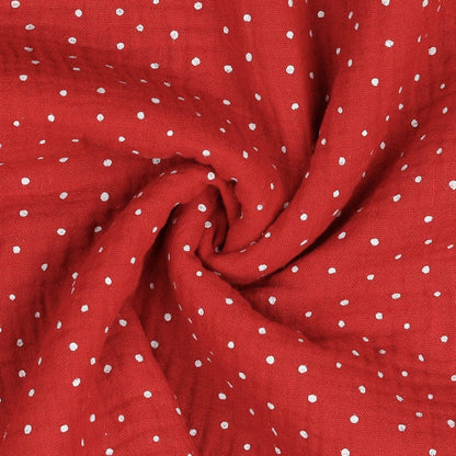 Muslin polka dots on a red background 125 g/m²