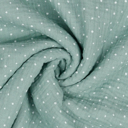 Muslin dots on a dark mint background 125 g/m²