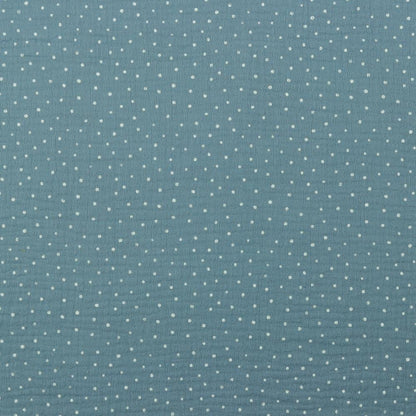 Muslin dots on a blue background 125 g/m²