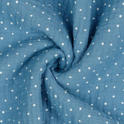 Muslin dots on a blue background 125 g/m²